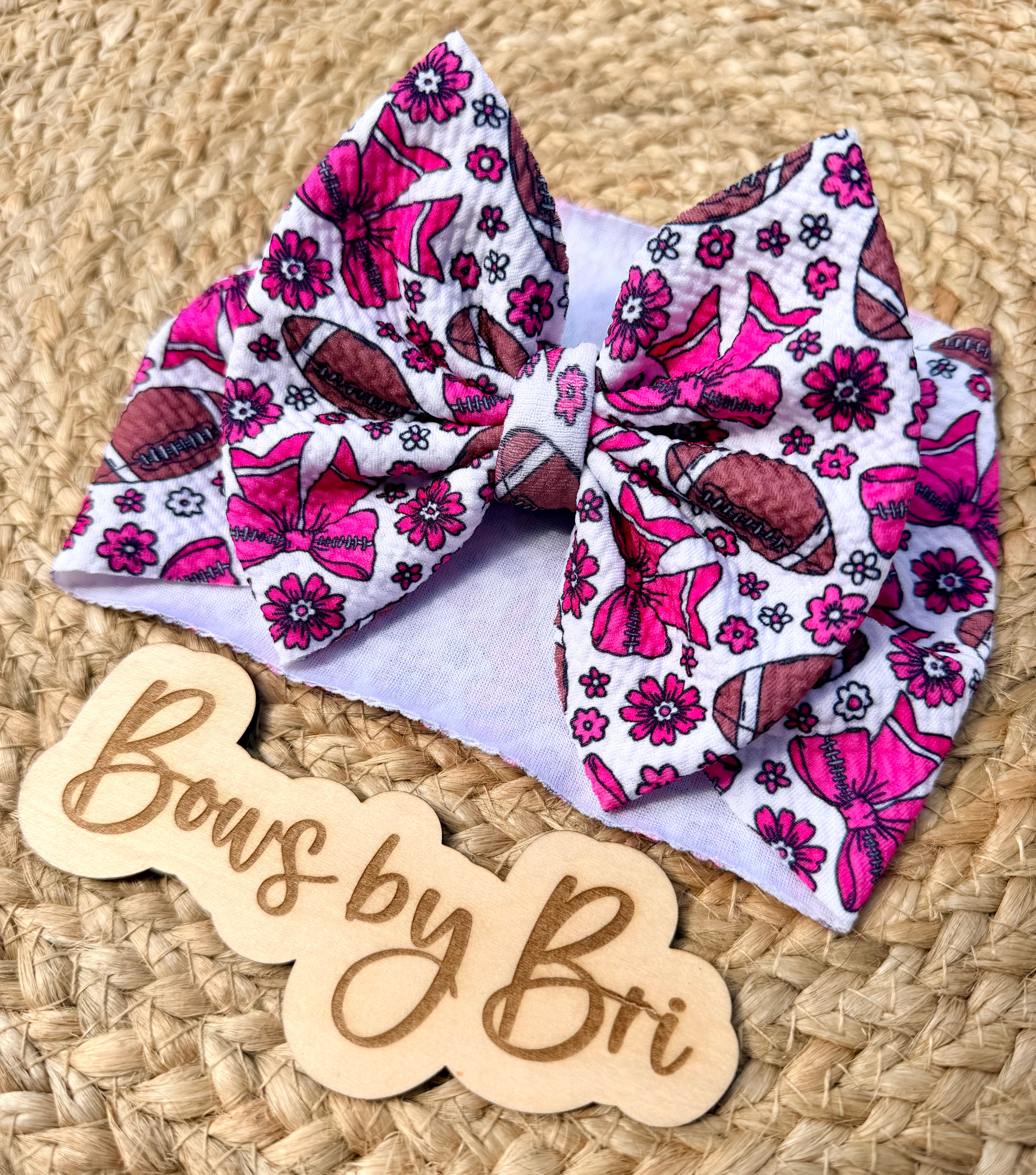 Pink football bows